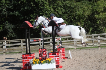 Tabitha Kyle wins The Stable Company HOYS 138cms Qualifier win at Bishop Burton College